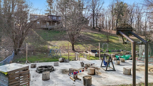 view of patio with an outdoor fire pit