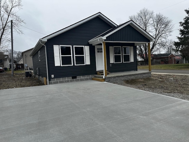 view of front of house featuring cooling unit