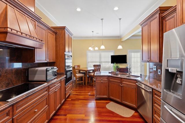 kitchen with premium range hood, dark wood-style flooring, ornamental molding, black appliances, and dark countertops