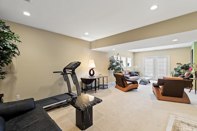 carpeted living area featuring recessed lighting