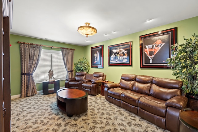 interior space with carpet and baseboards