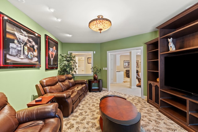 living room with carpet flooring and baseboards