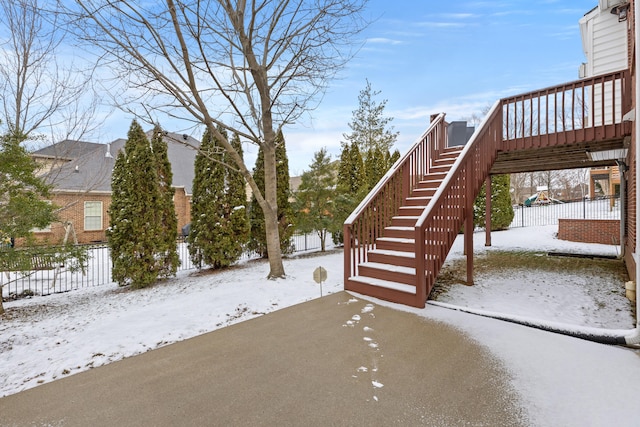 exterior space featuring stairway and fence