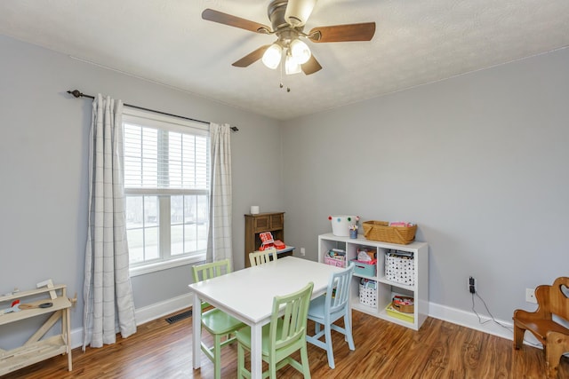 recreation room featuring hardwood / wood-style flooring and ceiling fan