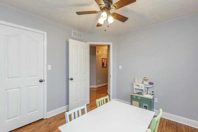 bedroom featuring hardwood / wood-style floors and ceiling fan