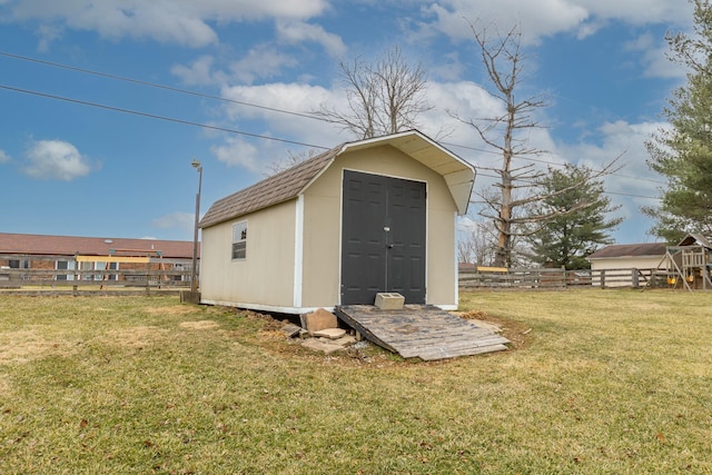 view of outdoor structure with a yard