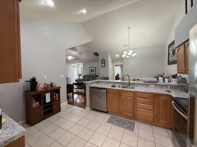 403 Chateau Pl, Bronston, KY 42518 - kitchen featuring sink, light tile patterned floors, appliances with stainless steel finishes, light stone countertops, and decorative light fixtures