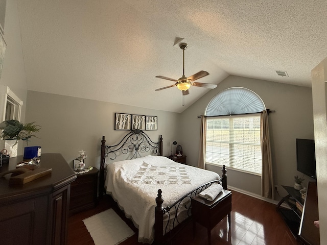 403 Chateau Pl, Bronston, KY 42518 - bedroom featuring ceiling fan, lofted ceiling, dark hardwood / wood-style flooring, and a textured ceiling