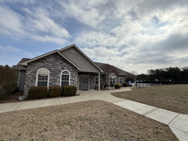403 Chateau Pl, Bronston, KY 42518 - ranch-style house with a front lawn