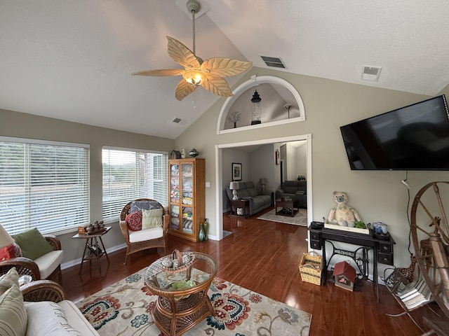 403 Chateau Pl, Bronston, KY 42518 - living room featuring dark wood-type flooring, ceiling fan, high vaulted ceiling, and a textured ceiling