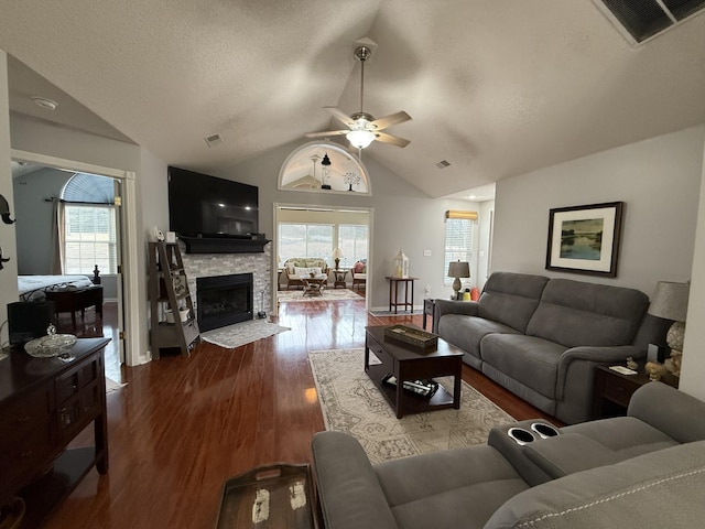 403 Chateau Pl, Bronston, KY 42518 - living room with lofted ceiling, hardwood / wood-style floors, plenty of natural light, and a fireplace