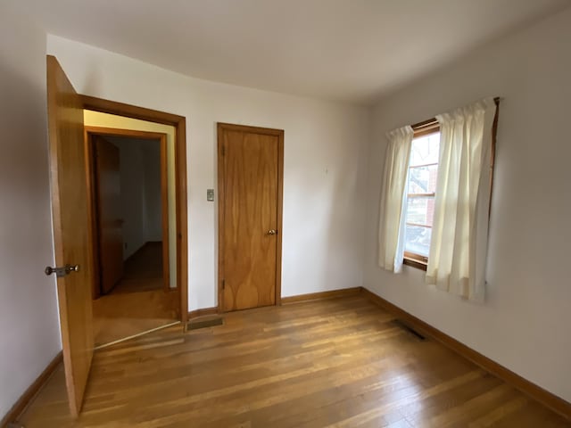 empty room featuring light wood-type flooring