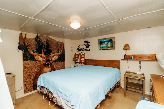 bedroom featuring light carpet