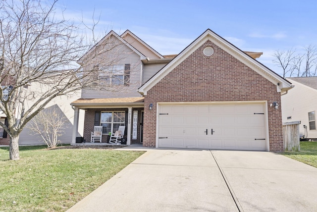 view of property with a garage, covered porch, and a front lawn