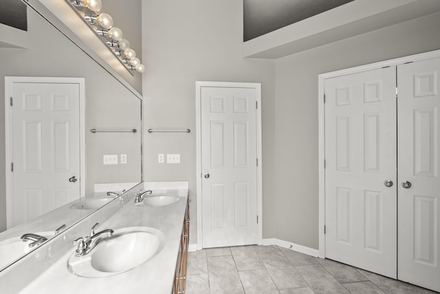 bathroom with vanity and tile patterned floors