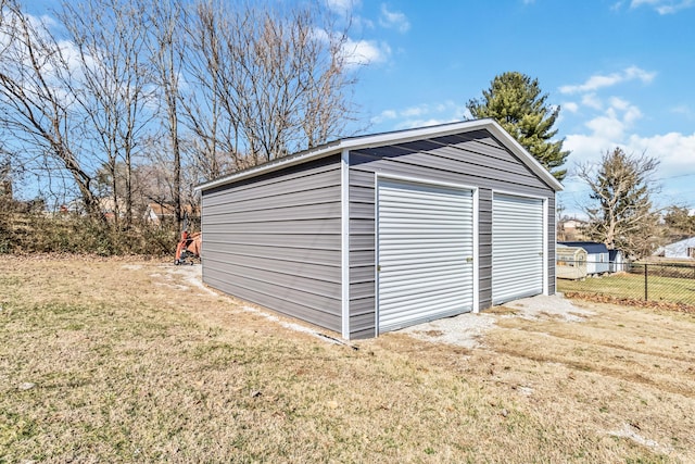 garage with a lawn