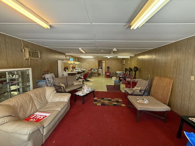 living room with a wall mounted air conditioner and wooden walls