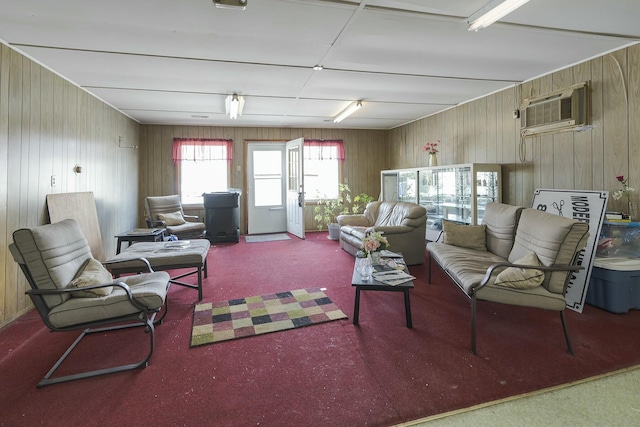 living room with carpet and a wall mounted air conditioner