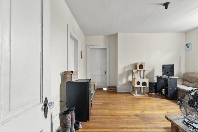 interior space with hardwood / wood-style floors