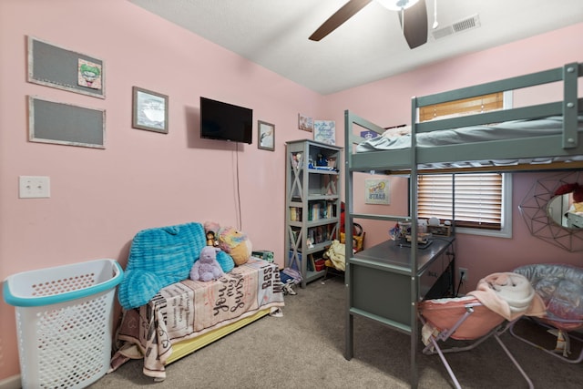 bedroom with ceiling fan and carpet floors