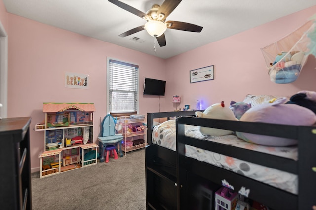 bedroom with ceiling fan and carpet flooring