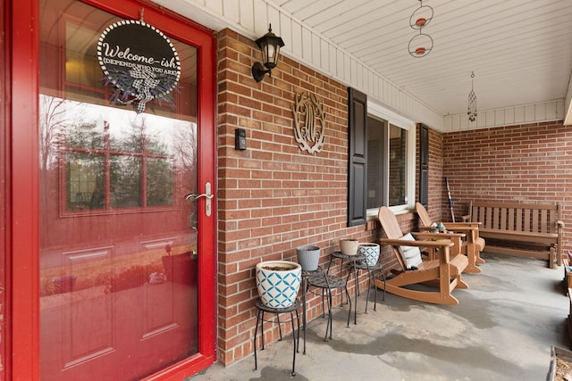 property entrance featuring covered porch