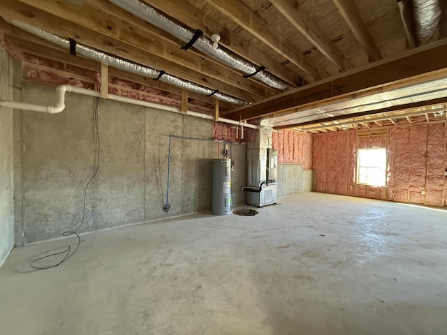 basement with electric water heater and heating unit