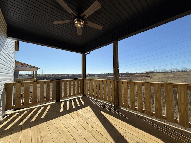 wooden deck with ceiling fan