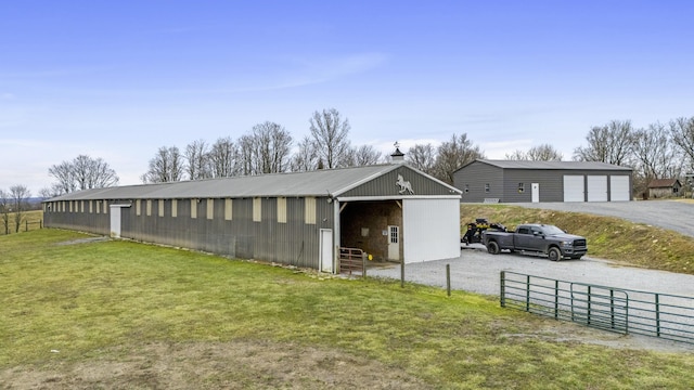 view of outdoor structure with a lawn