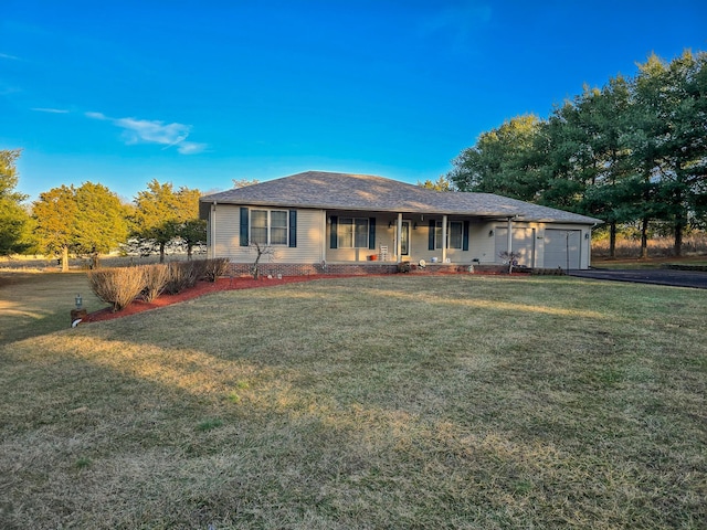 ranch-style home with a porch, a garage, and a front yard