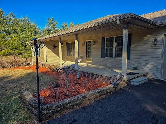 ranch-style home with a patio