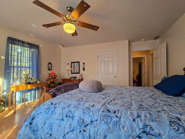 bedroom featuring ceiling fan