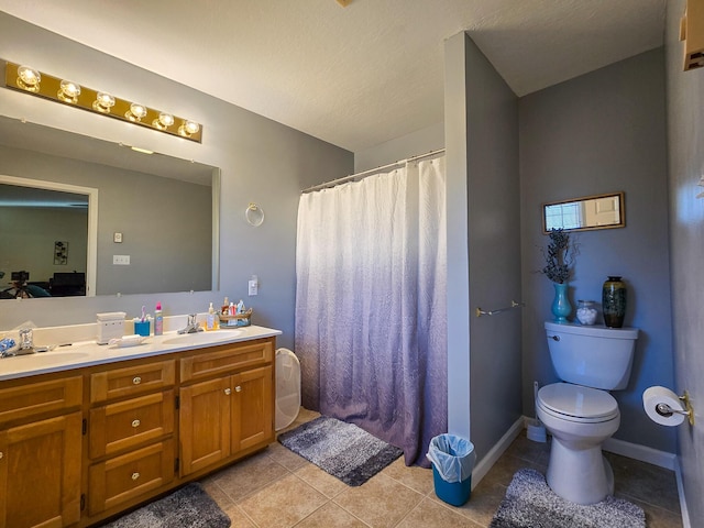 bathroom featuring a shower with curtain, vanity, tile patterned floors, and toilet