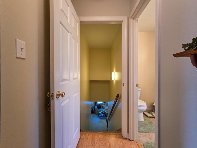 hallway with light wood-type flooring