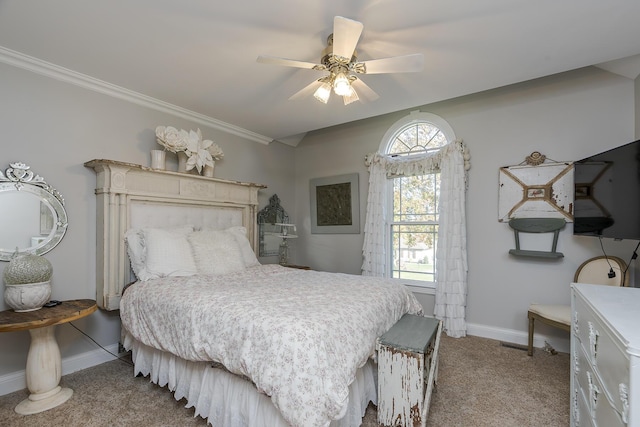 carpeted bedroom with crown molding and ceiling fan