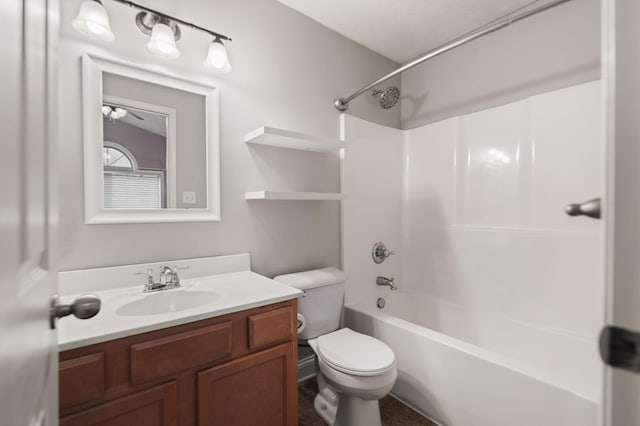 full bathroom featuring shower / bathtub combination, vanity, and toilet