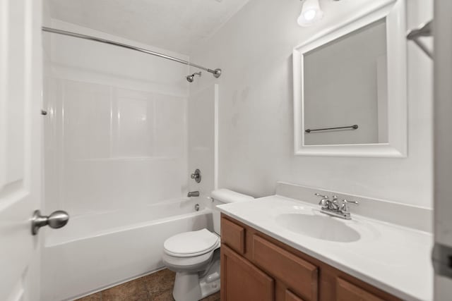 full bathroom featuring toilet, vanity, and bathtub / shower combination