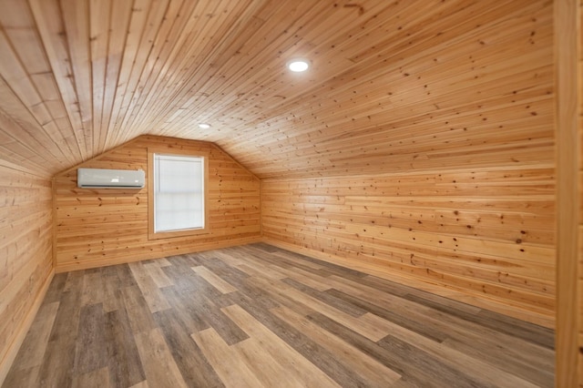 additional living space featuring wooden walls, wooden ceiling, wood finished floors, vaulted ceiling, and an AC wall unit