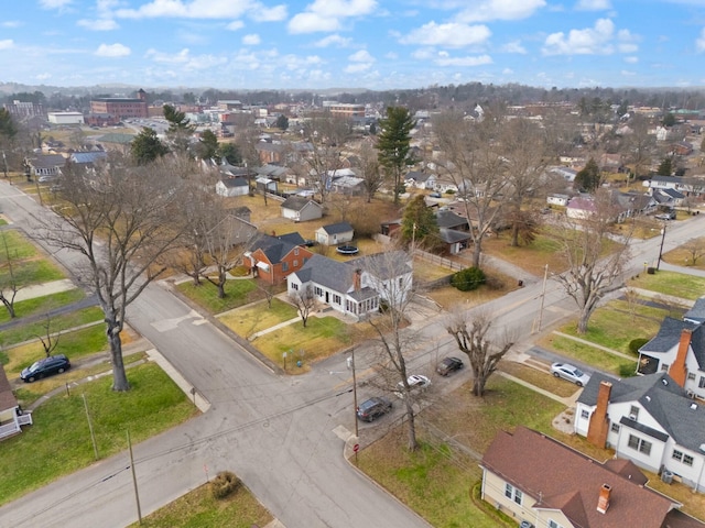 birds eye view of property with a residential view