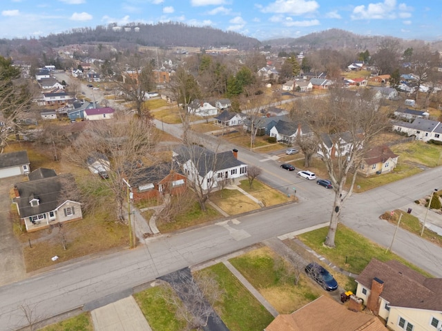 birds eye view of property with a residential view