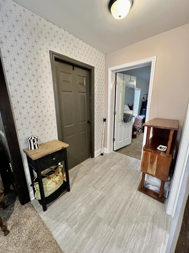 corridor featuring hardwood / wood-style flooring