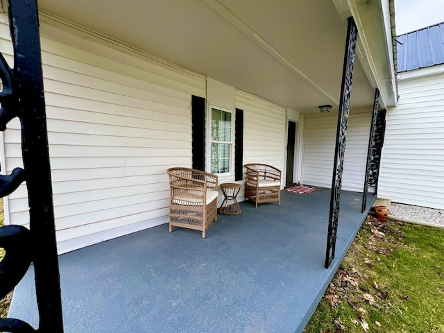 view of patio featuring covered porch