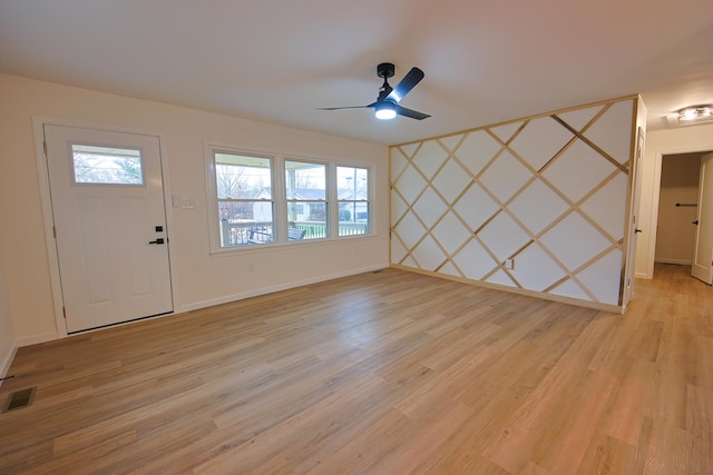 entrance foyer with light hardwood / wood-style floors and ceiling fan