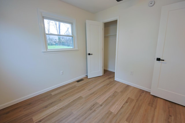 unfurnished bedroom featuring light hardwood / wood-style flooring