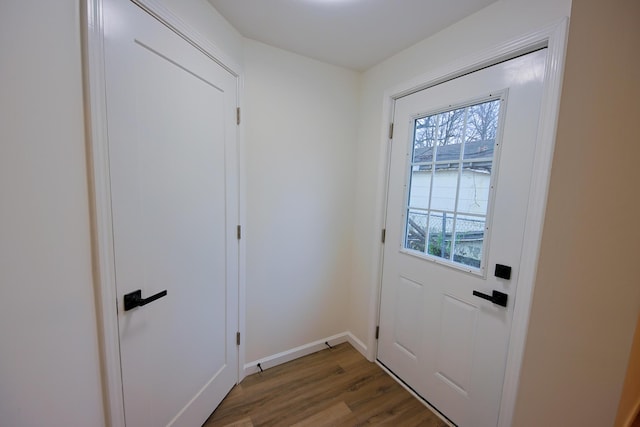 doorway to outside featuring hardwood / wood-style flooring