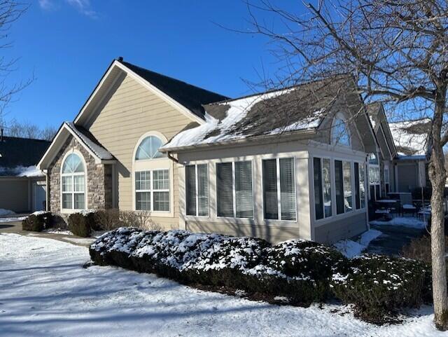 view of snow covered property