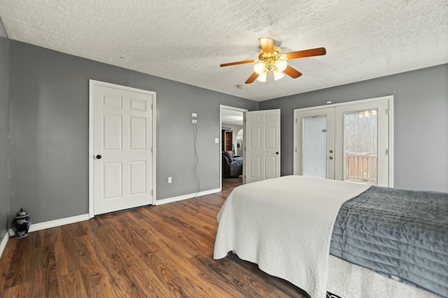 251 A Duncan Rd, Strunk, KY 42649 - bedroom featuring french doors, access to outside, wood finished floors, a textured ceiling, and ceiling fan