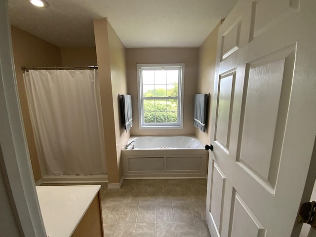 251 A Duncan Rd, Strunk, KY 42649 - full bath featuring a garden tub, a shower with shower curtain, vanity, and recessed lighting