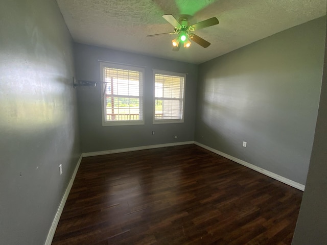 251 A Duncan Rd, Strunk, KY 42649 - empty room with dark wood-type flooring, a textured ceiling, and ceiling fan