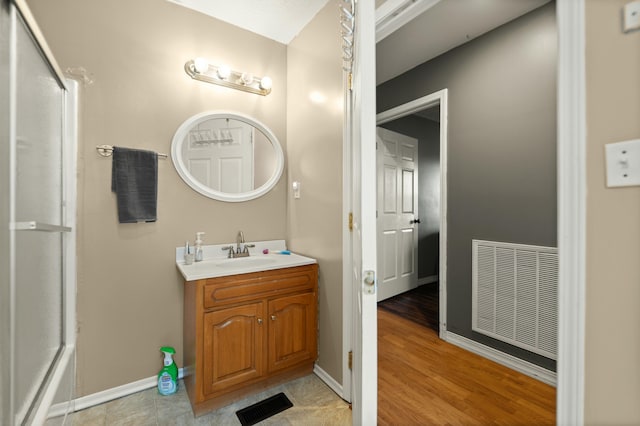 251 A Duncan Rd, Strunk, KY 42649 - bathroom with vanity, a shower, and wood finished floors
